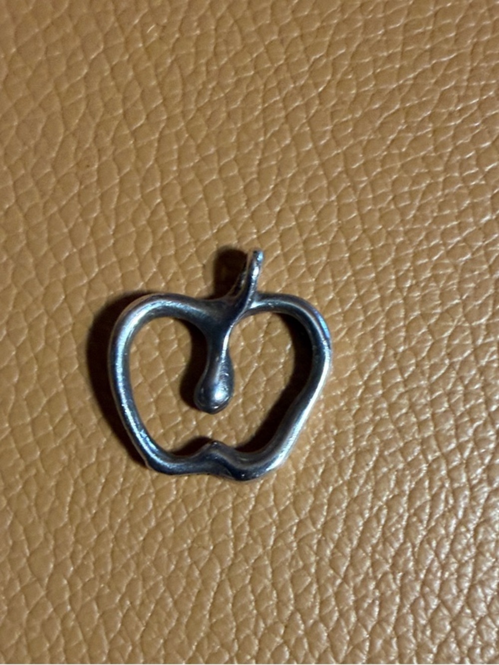 Tiffany & co Sterling silver Apple outline pendant.